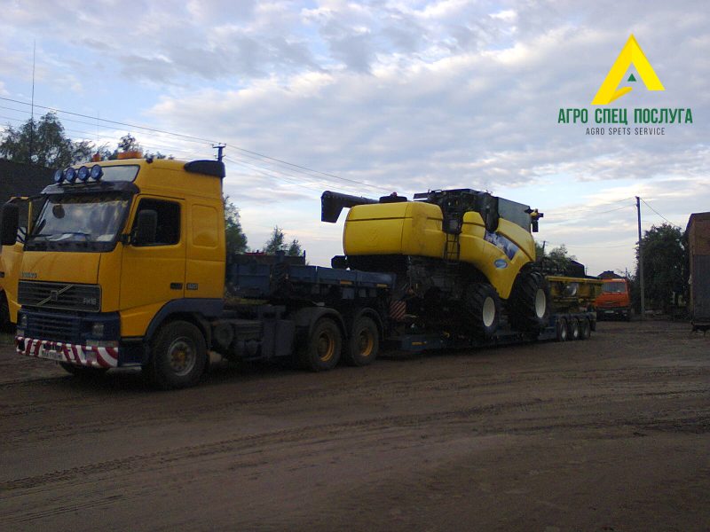 Перевозка негабарита: комбайн с жаткой New Holland